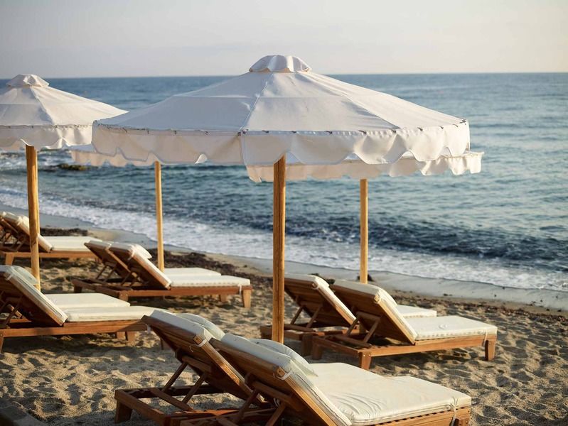 Mitsis Selection Laguna Hersonissos  Exterior foto Beach chairs and umbrella